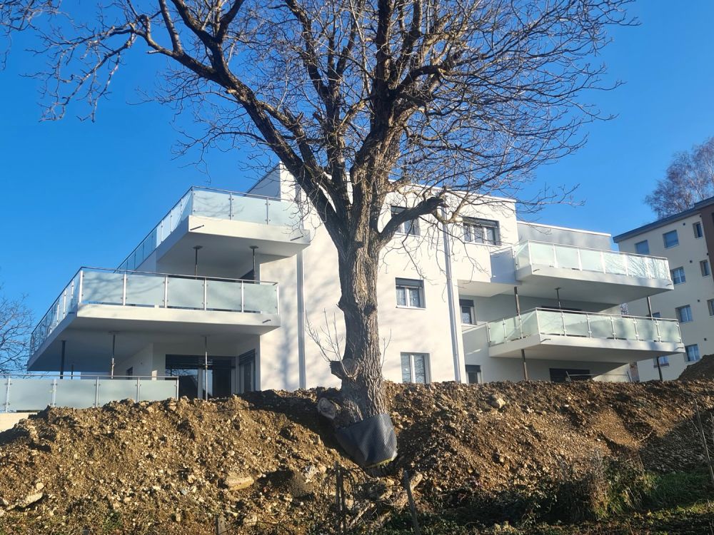 Splendide attique neuf de haut standing en PPE de 3,5 pièces avec place de parc dans le garage - Bild 2