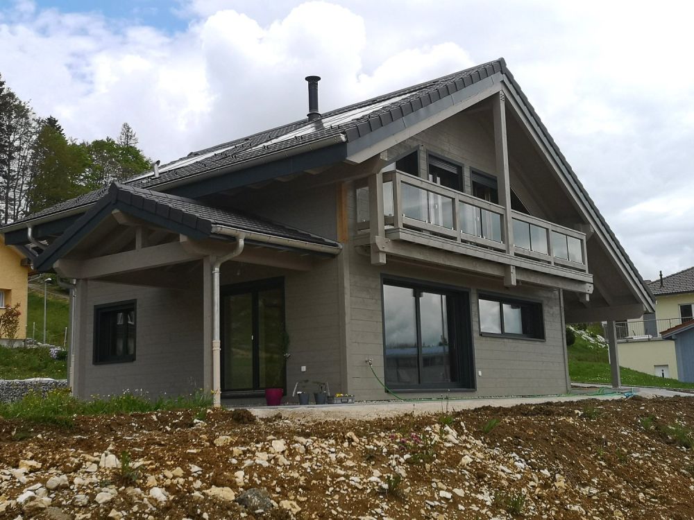 Maison moderne en madrier thermo-chauffé, avec garage, terrasse et jardin -  Bild 3