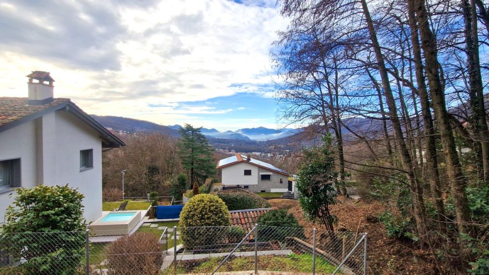 Nuovo 4,5 locali in stile moderno con veranda e ampio giardino privato -  Bild 1