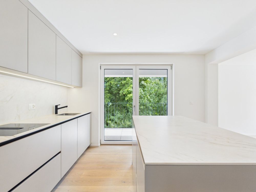 2.5-Zimmer Eigentumswohnung mit See-, Stadt- und Bergsicht! -  Bild 2