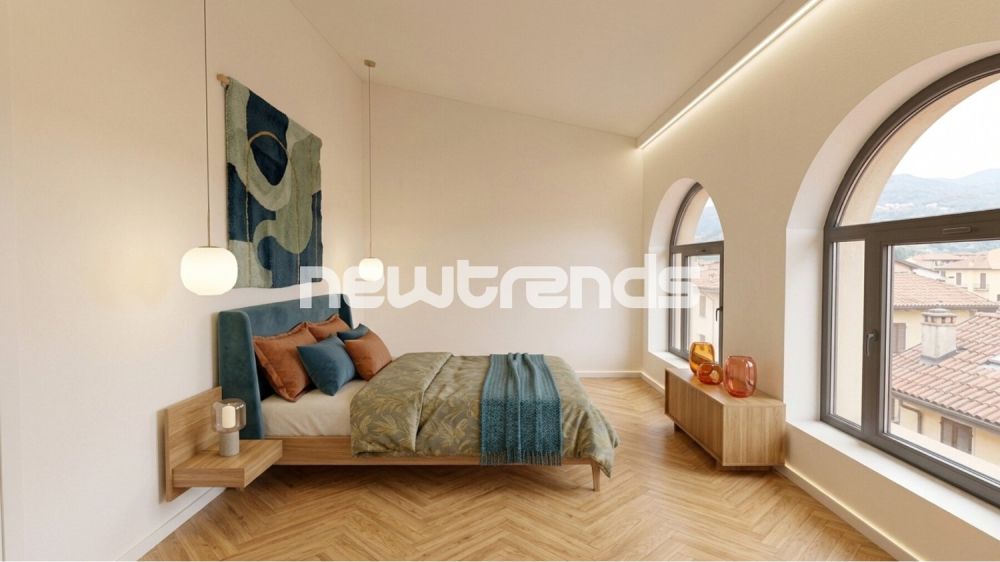 Pura-Caslano: Nuovo attico di 3.5 locali - camera da letto