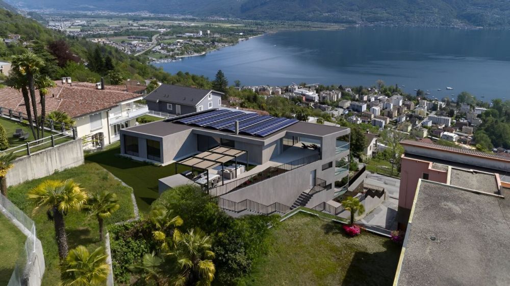 Moderno ed esclusivo attico di 4.5 locali con spettacolare vista lago, giardino e piscina privata -  Bild 5