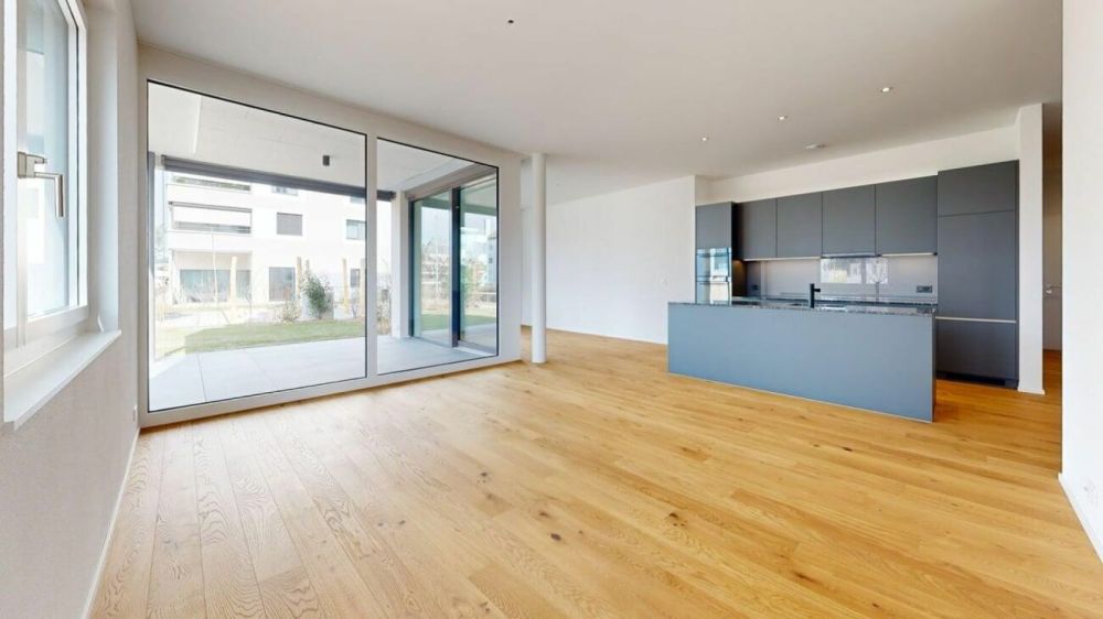 Exklusive 5.5-Zimmer-Gartenwohnung an bester Lage - Wohn-Essbereich mit Küche