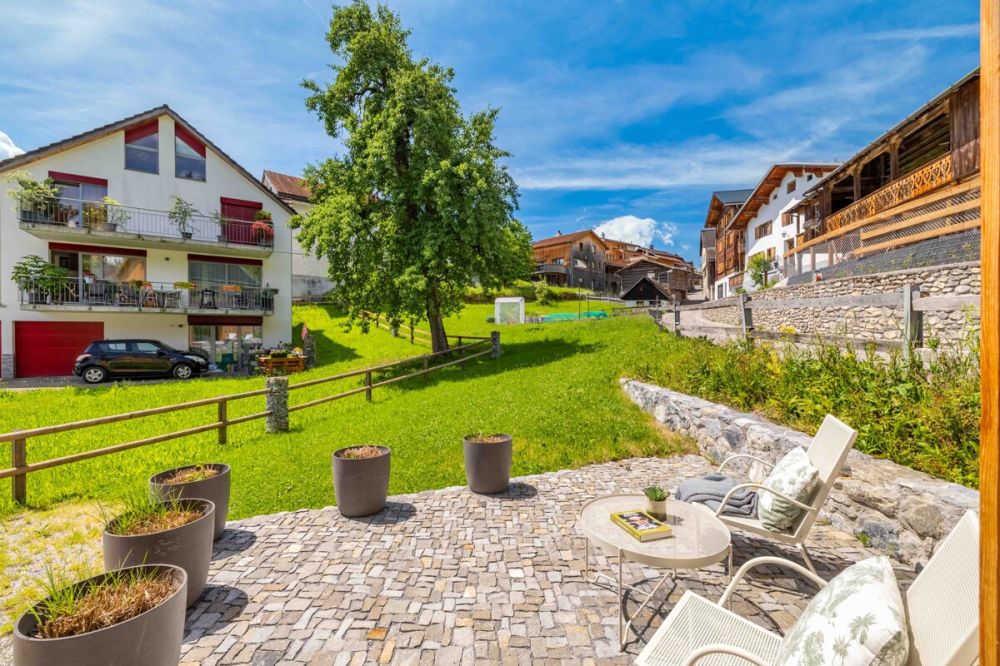 Ferienhaus mit Aussicht und moderner Architektur in Seewis - OW361_Garten