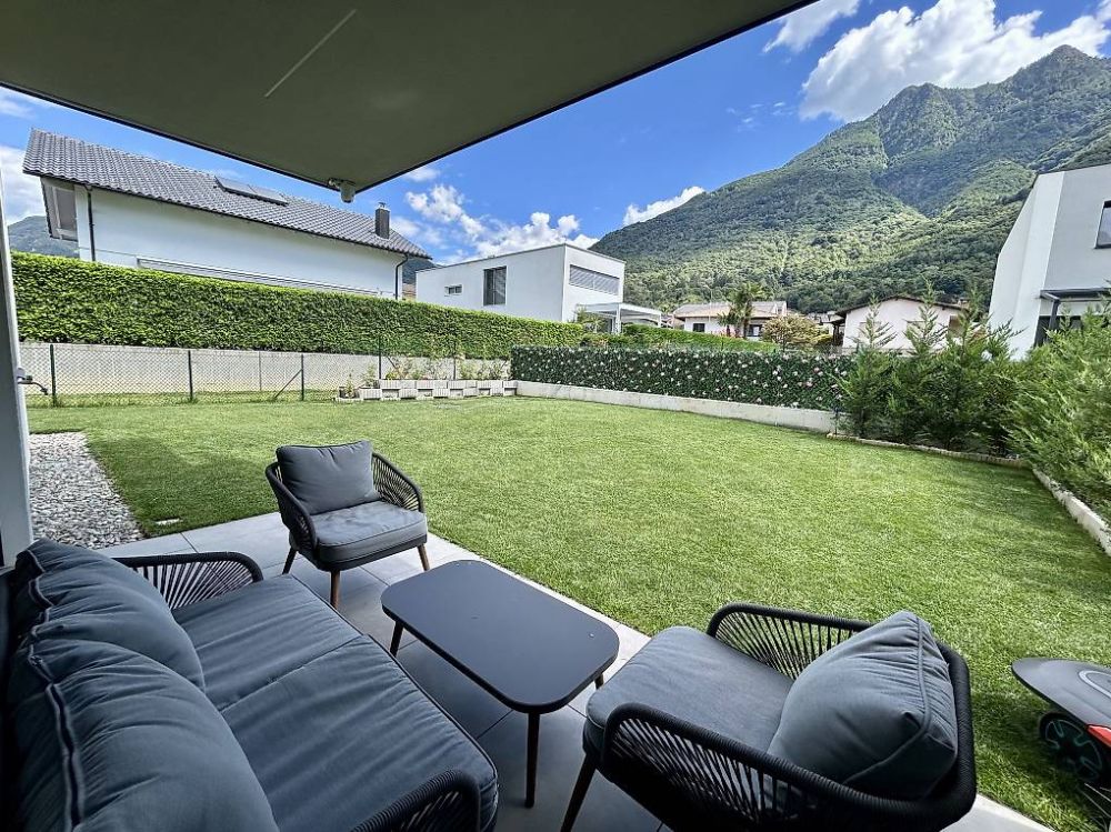 Nuovo e moderno appartamento con giardino privato -  Bild 1