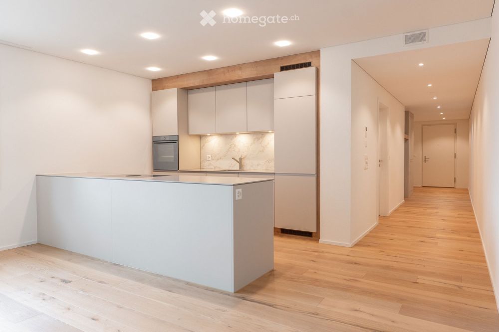 Moderne 5.5 Zimmer Eigentumswohnung mit grossem Sitzplatz -  Bild 1