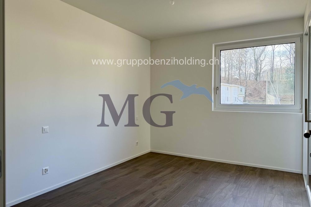 Moderno appartamento di 2.5 locali in zona residenziale - Bild 7