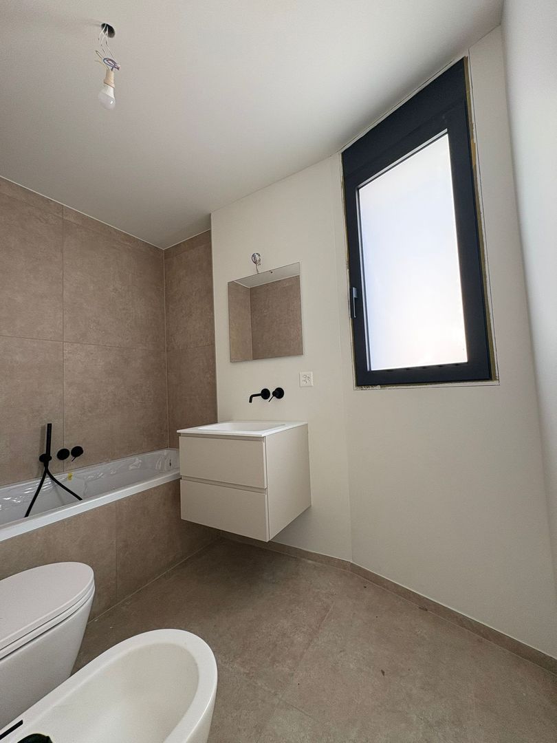 Moderno appartamento di 3.5 locali con ampia terrazza a Giubiasco -  Bild 11