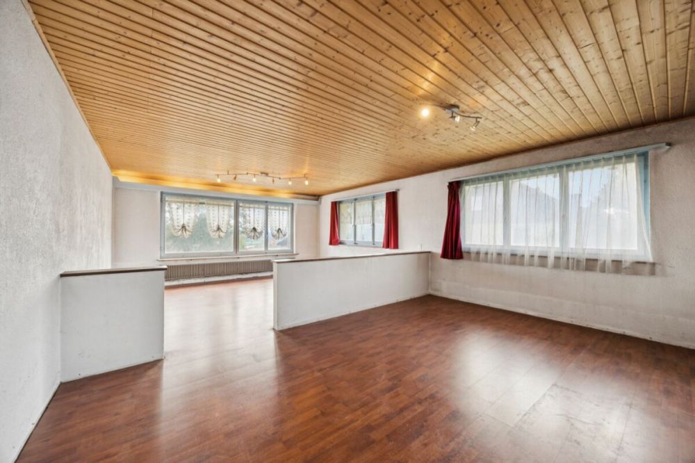 Bauland mit Altbauliegenschaft in Bettlach mit vielseitigen Nutzungsmöglichkeiten - Wohnzimmer