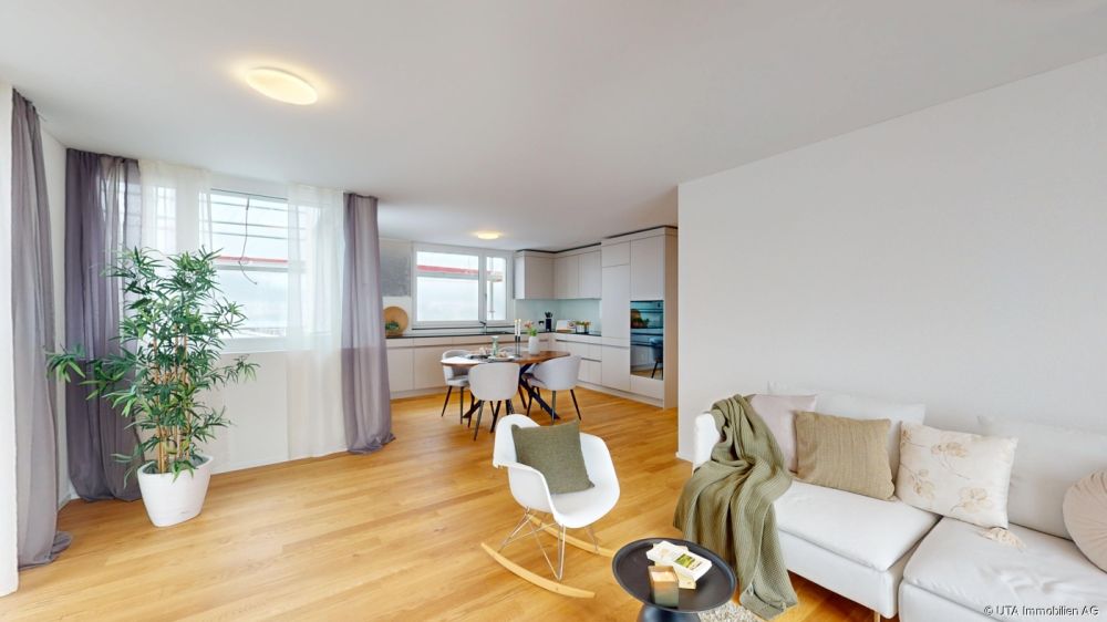 Attraktive 2.5-Zimmer-Neubauwohnungen an ruhiger und zentraler Lage - Musterwohnung Attika - Wohnzimmer