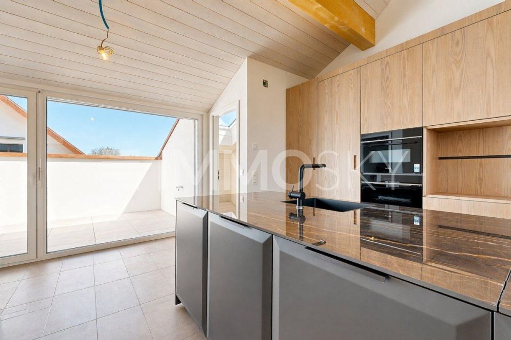 Superbe duplex 4.5 pièces neuf au coeur de Sullens (lot 2) - Superbe cuisine lumineuse donnant sur le balcon