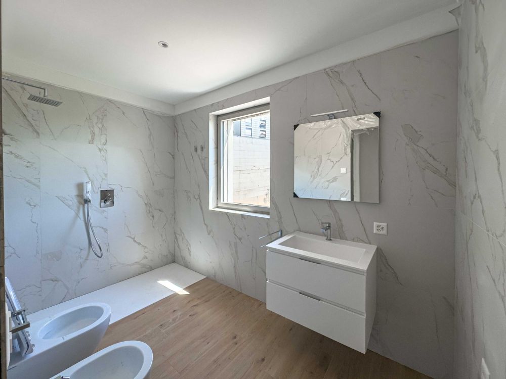 Nuovo 2.5 locali con terrazzo a Vezia - Bild 6