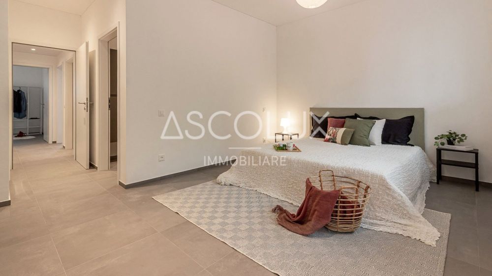 Moderne Räume - 4.5 Zimmer in einer exklusiven Residenz am Stadtrand  | Spazi Moderni - 4.5 Locali in Residenza Esclusiva ai Confini della Città - pregassona quadri-054.jpg