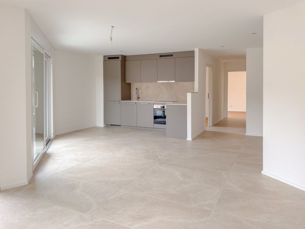 Appt PPE neuf de 3.5 pces, terrasse et jardin Campagne Pernod, lot B2 - Espace salon/séjour avec portes-fenêtres donnant accès à la terrasse et au jardin privatif