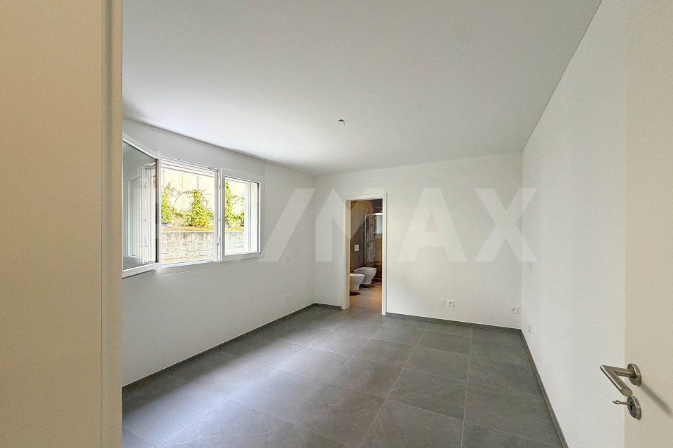Appartamento 3.5 con giardino e 2 posti auto -  Bild 11