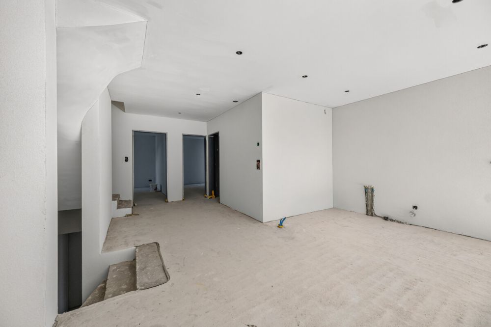 Modernes Reihenmittelhaus mit hohem Wohnkomfort - Wohn-Essbereich im Rohbau