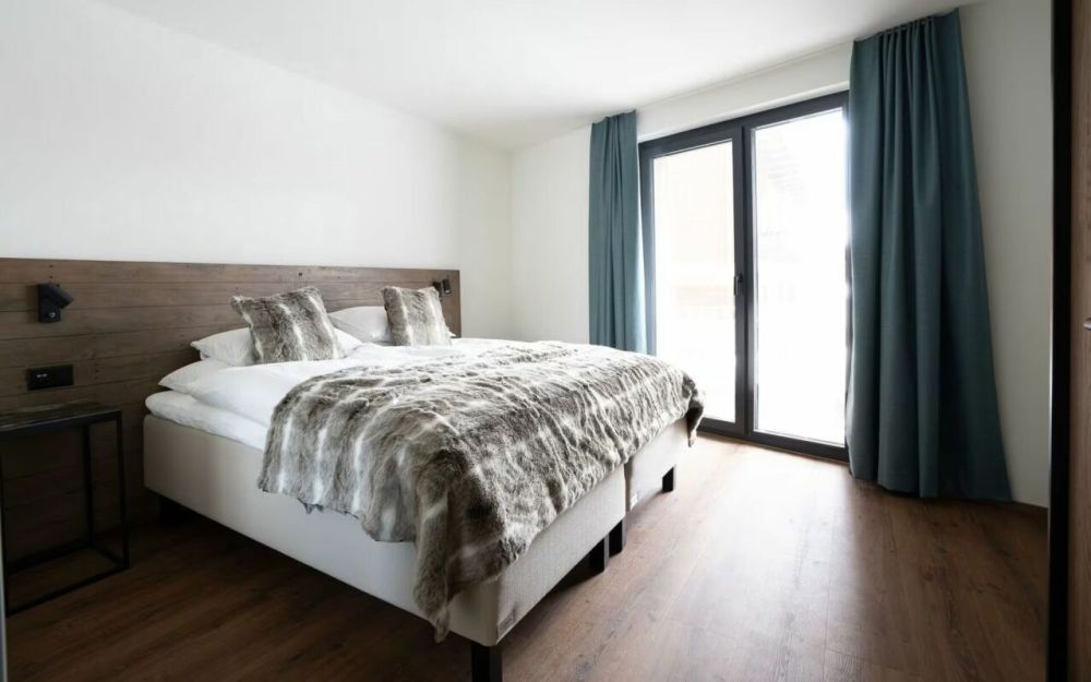 Nordic Neubau direkt bei der Skipiste. Hotelmässig bewirtschaftete Zweitwohnung. - Bild 4