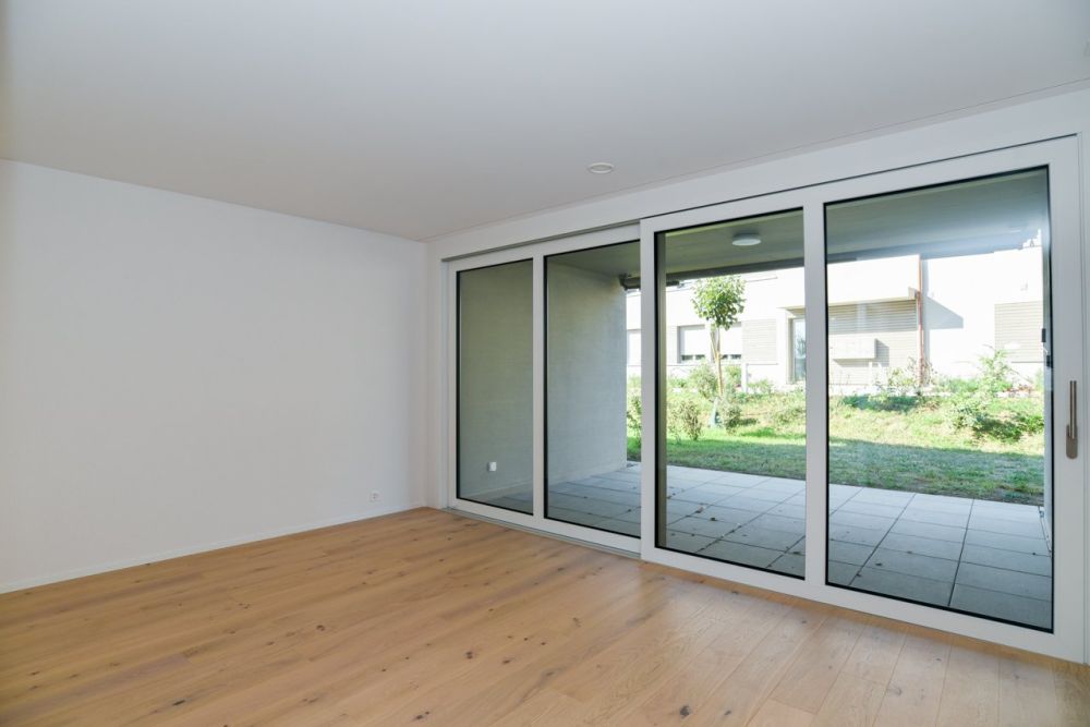 Neubau-Gartenwohnung mit moderner Haustechnik und offenem Grundriss - Wohnzimmer