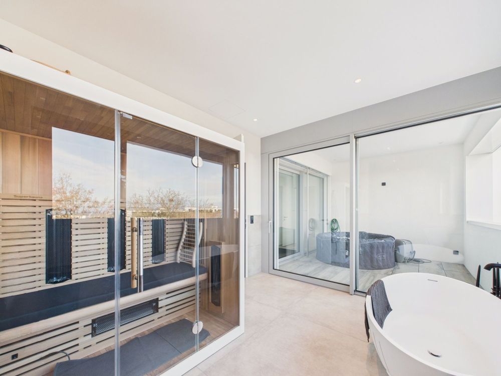 Exklusive 5.5-Zimmer-Neubau-Wohnung mit Kamin, Sauna und Seeblick in Bottighofen - Image 7