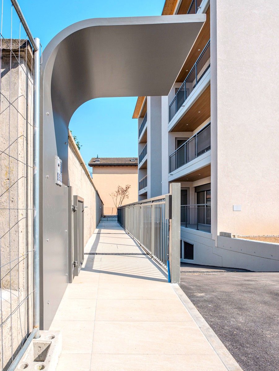 Nuovissimo appartamento 2.5 locali con giardino privato e portico -  Bild 12