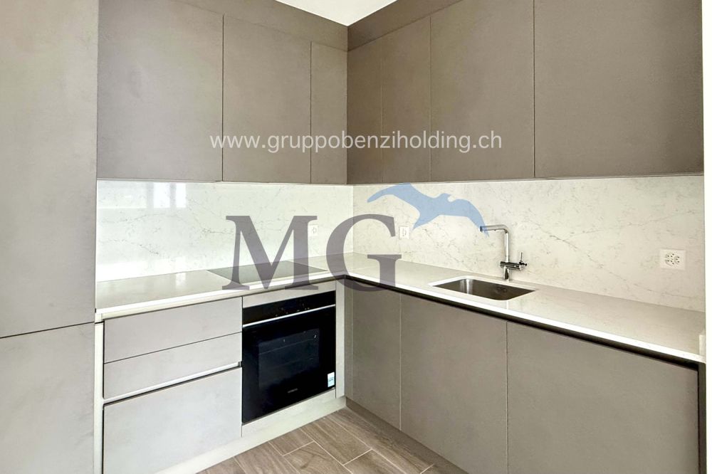 Moderno appartamento di 2.5 locali in zona residenziale - Bild 12