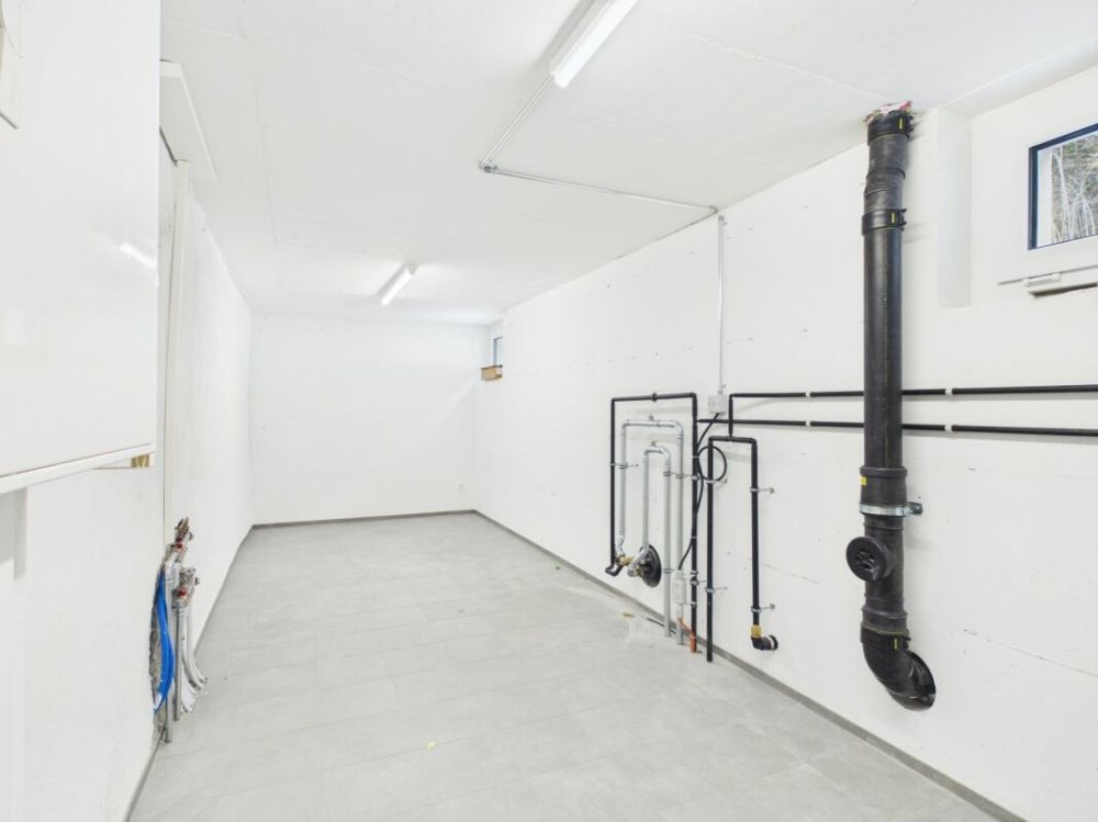 Exklusives Zweihaus-Anwesen mit vier Garagenplätzen und historischem Gewölbekeller -  Bild 13