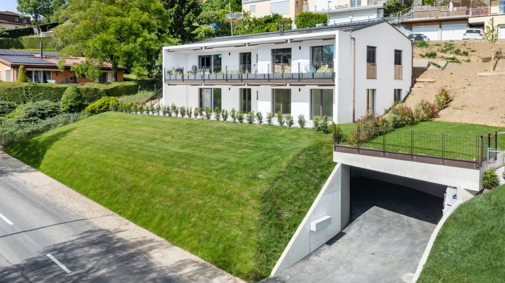 Neuf | Terrasse & jardin avec vue lac -  Bild 12
