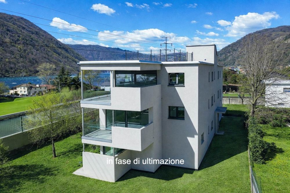 Moderno e nuovo 3.5 locali duplex con giardino a Melano -  Bild 4