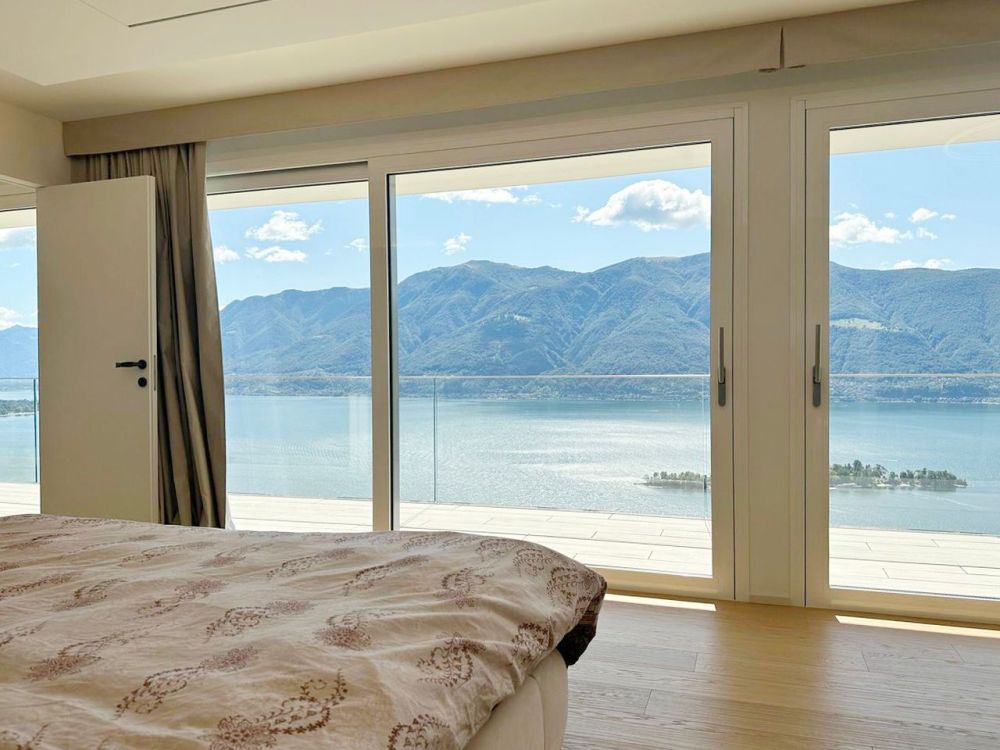 VILLA EXTRALUSSO CON IMPERDIBILE VISTA SULLE ISOLE DI BRISSAGO -  Bild 8