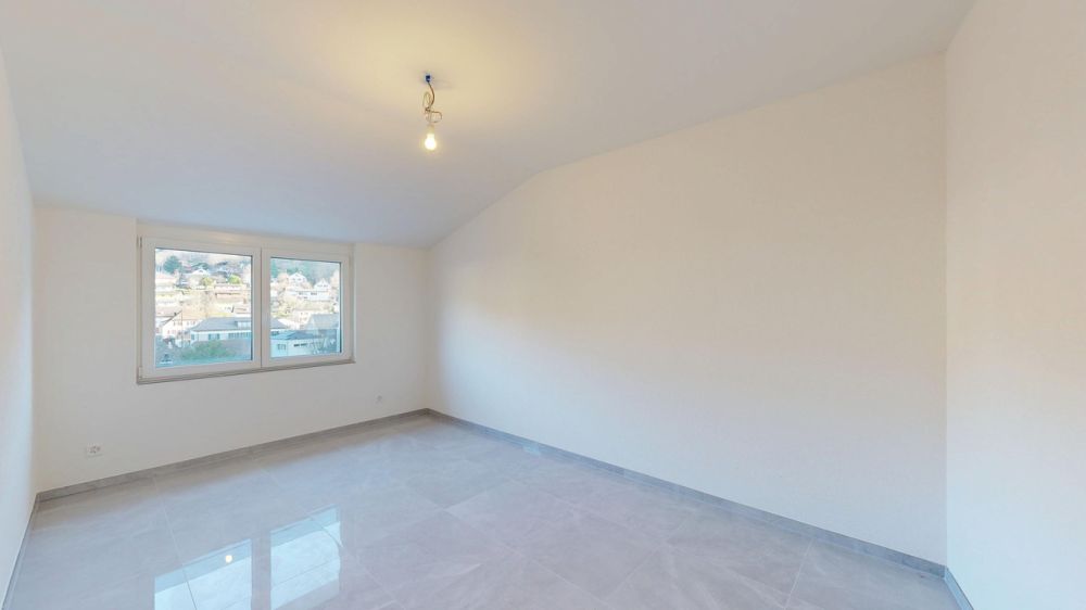 Moderne 4.5-Zimmer-Eigentumswohnung mit Balkon - Zimmer 2