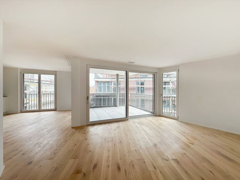 Attraktive Neubauwohnung in ruhigem Quartier! - Wohnzimmer