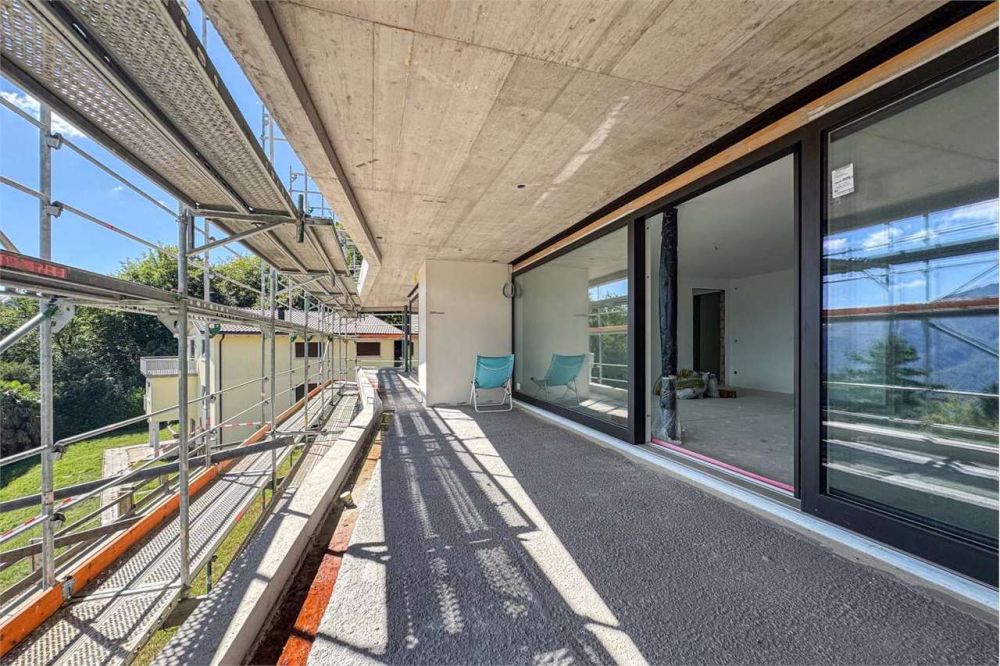 Raffinato appartamento 3.5 locali con vista lago, in residenza esclusi - Bild 12