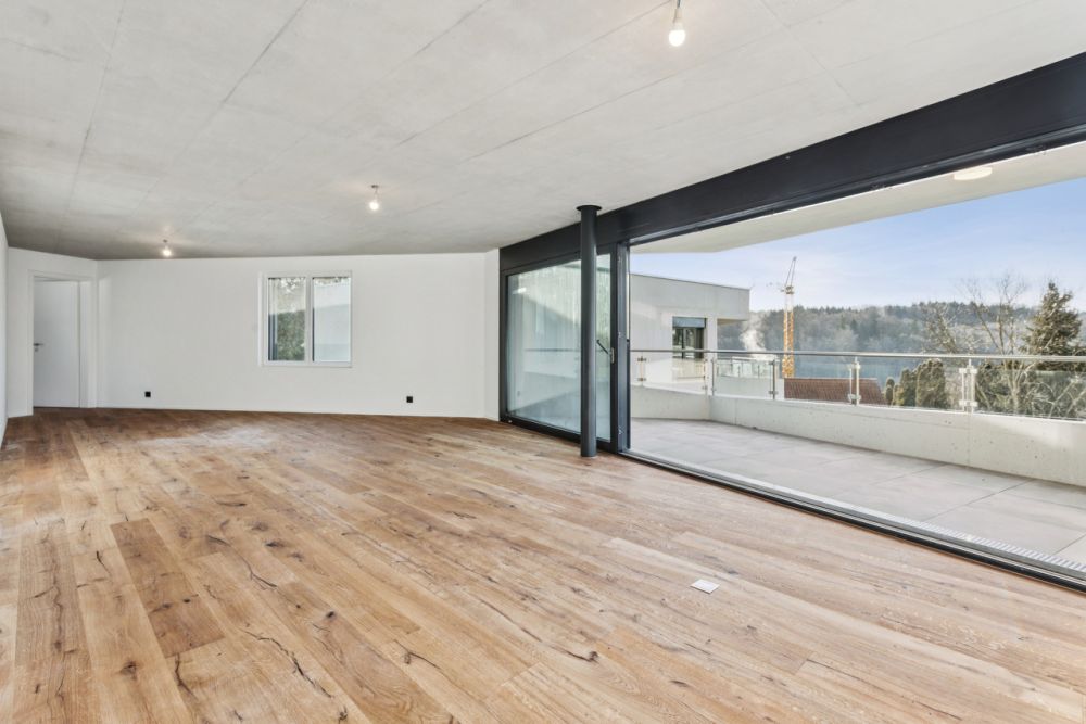 EXCLUSIVITE ! Magnifique appartement neuf de 5.5 pces à Belfaux - La pièce à vivre avec accès au balcon