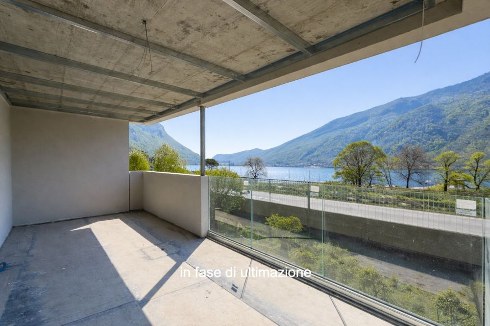 Moderno e nuovo 3.5 locali duplex con giardino a Melano -  Bild 5