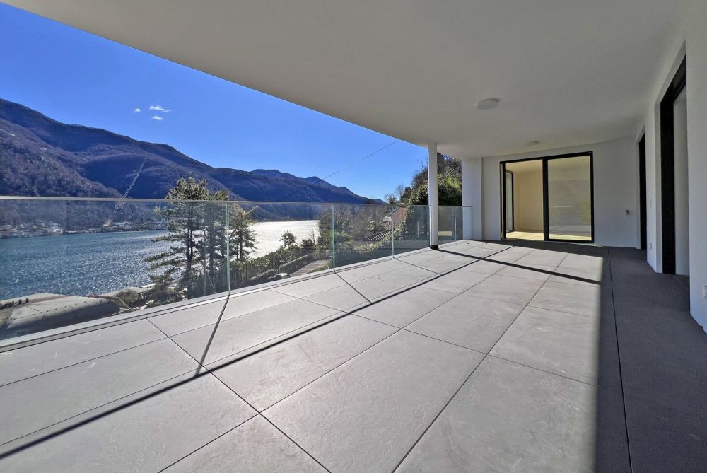 MERAVIGLIOSA VILLA CON VISTA LAGO PANORAMICA A VICO MORCOTE - Bild 7