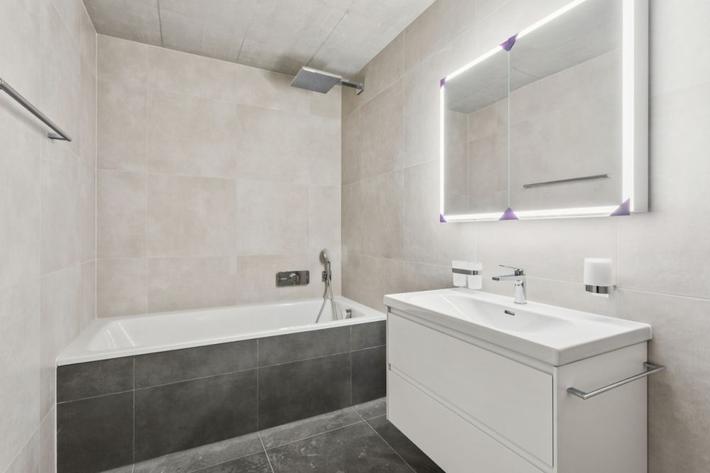 EXCLUSIVITE ! Magnifique appartement neuf de 5.5 pces à Belfaux - La salle de bains en suite parentale