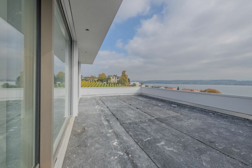 GROSSEN IMMOBILIEN - Exklusive 4.5-Zimmer-Maisonettewohnung mit Seesicht - Bild 4