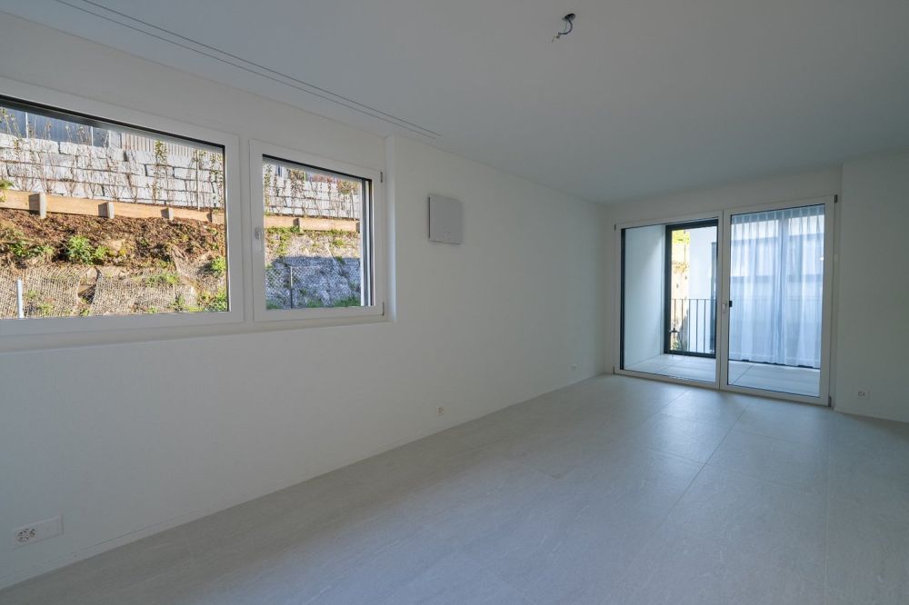 2.5 Zi-Neubauwohnung mit Seesicht und Wintergarten - Zimmer mit Ausgang zum Wintergarten / Loggia