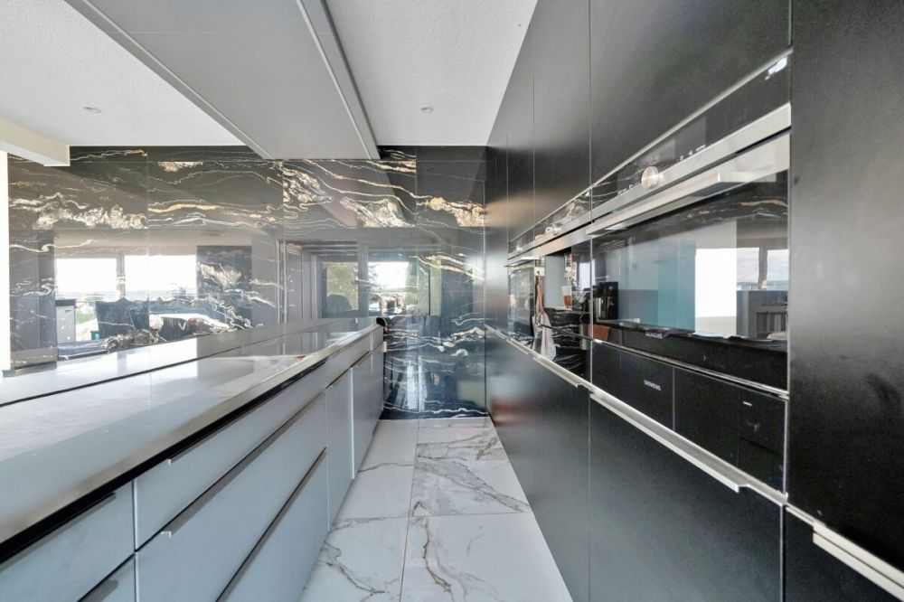 Rendite von 3.66% - Saniertes Mehrfamilienhaus mit 5 Wohneinheiten und Einstellhalle - Bild 13