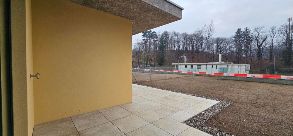 Moderno appartamento 2.5 locali con vista panoramica a Davesco-Soragno - Bild 10