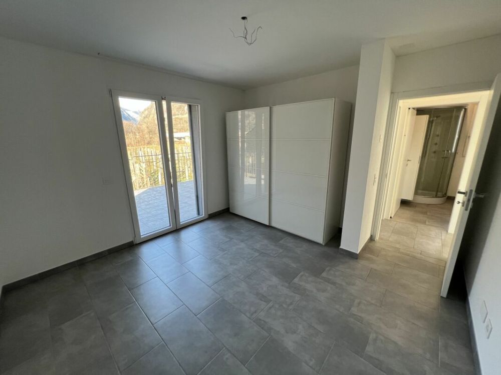 Moderna casa bifamiliare individuale, di 4.5 +3.5 locali con ampio giardino - Bild 13