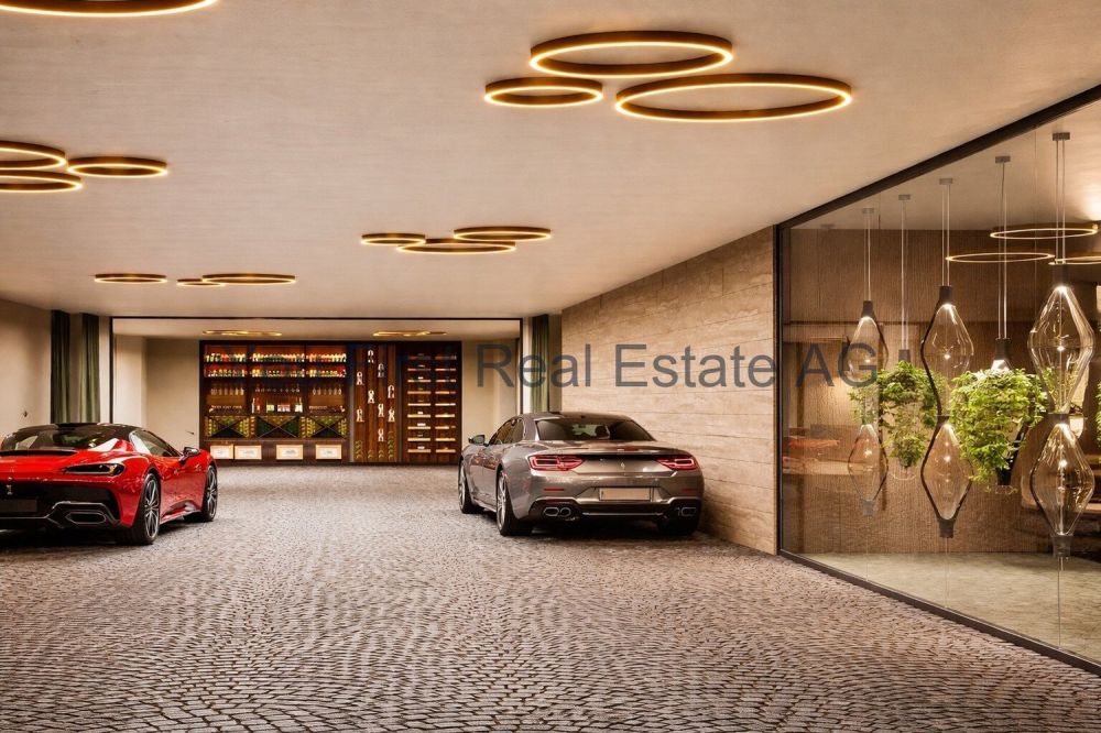 Luxuriöses Wohnen mit Seeblick in Eich  Ein Traum wird wahr! - Luxus-Garage mit Design-Highlight: Exklusive Stellfläche für Sammler und Autoliebhaber