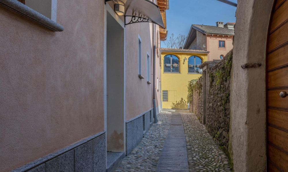 Wohnung mit 2.5 Zimmern im Kern mit Garten in Sigirino -  Bild 8