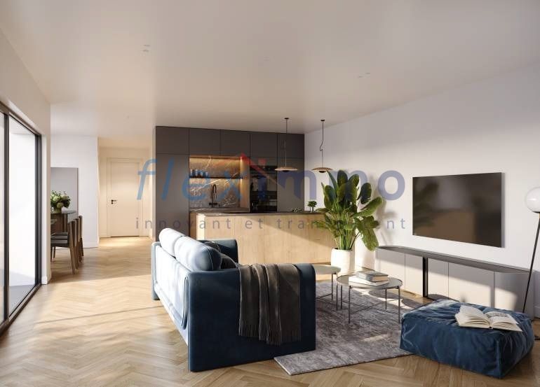 Projet Neuf - Le Paradis des Familles - Image non contractuelle / a modern apartment with hardwood floors, a large living room with a blue couch, a tv, and a table with a plant plant on it