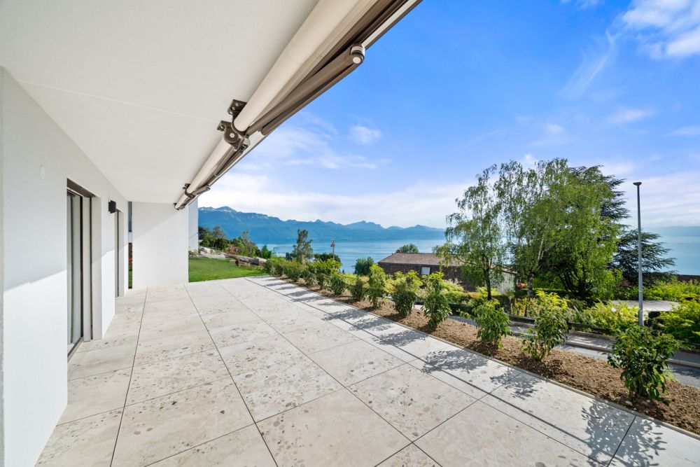 Neuf | Terrasse & jardin avec vue lac -  Bild 1
