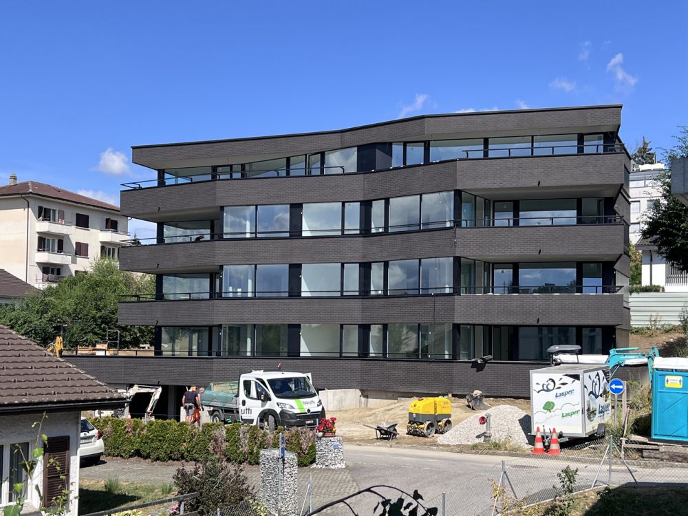 4.5 pièces au rez-de-jardin - Élégance architecturale ! - La Résidence Chamblioux 22 - Immeuble en cours de finition