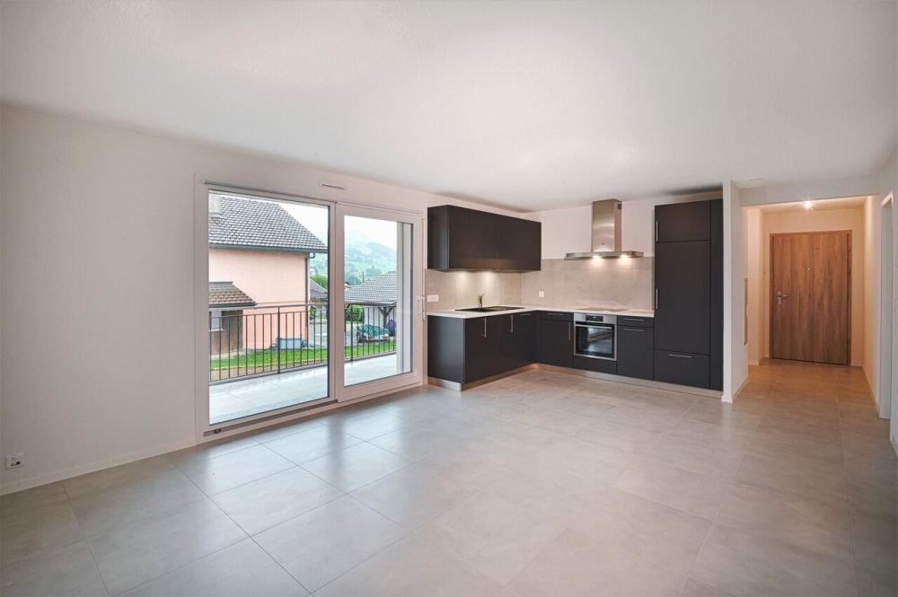 Appartement neuf de 2.5 pièces au coeur d'Oron-la-Ville - Précédente réalisation - Séjour - non contractuel