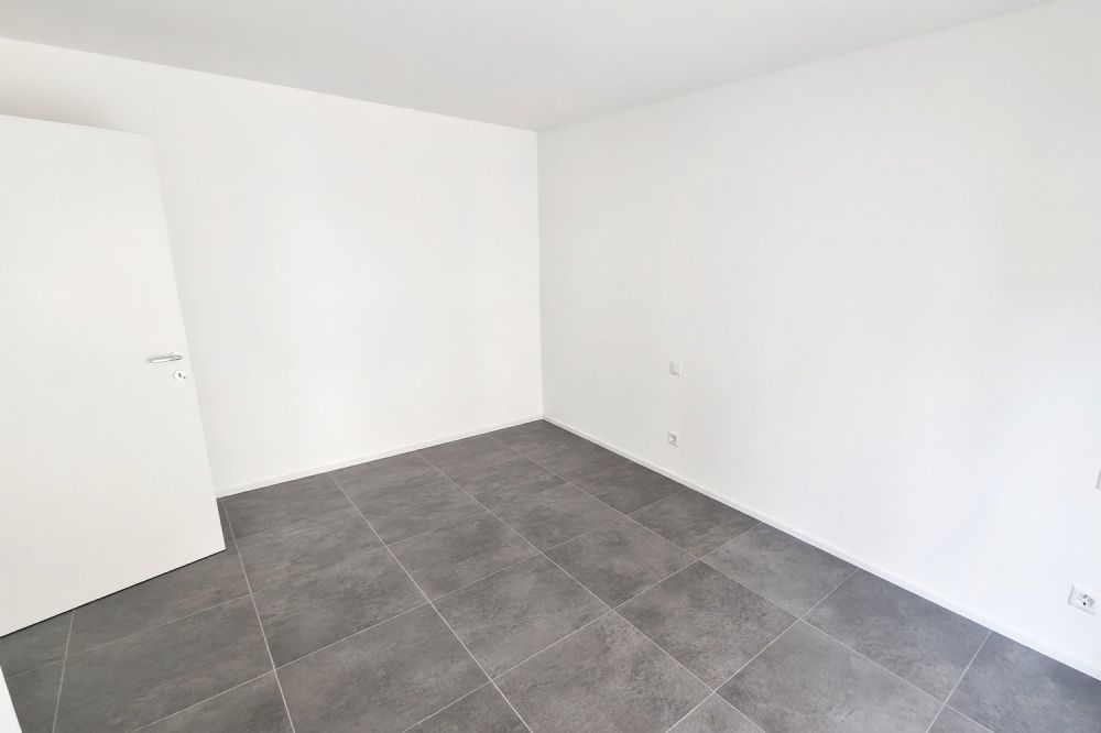 Nuovo appartamento 3,5 con terrazza coperta e due balconi -  Bild 11