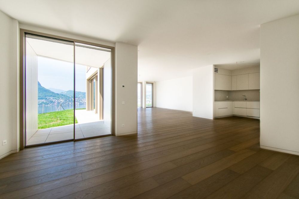 LUSSUOSO APPARTAMENTO CON GIARDINO PANORAMICO E VISTA LAGO -  Bild 4