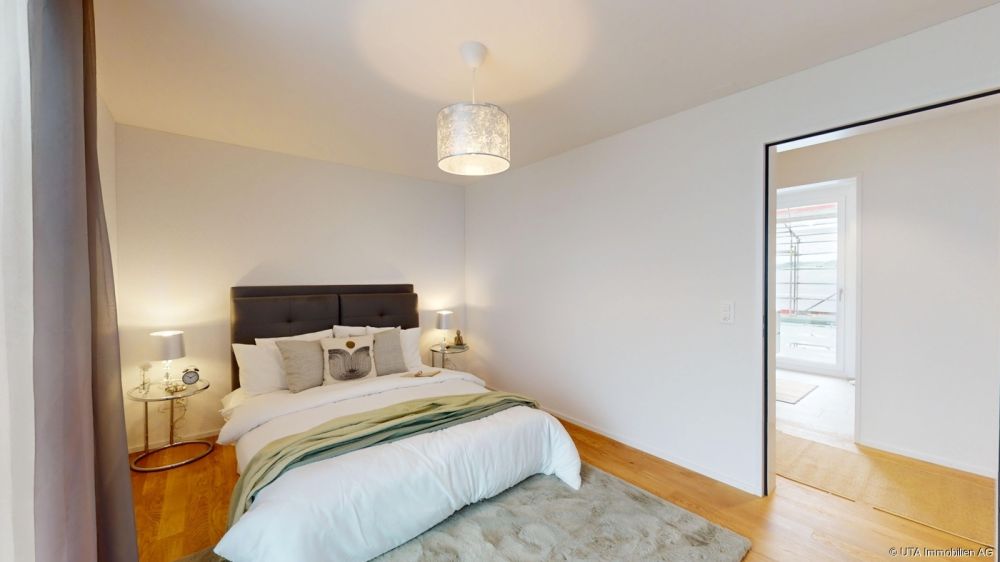 Attraktive 2.5-Zimmer-Neubauwohnungen an ruhiger und zentraler Lage - Musterwohnung Attika - Schlafzimmer